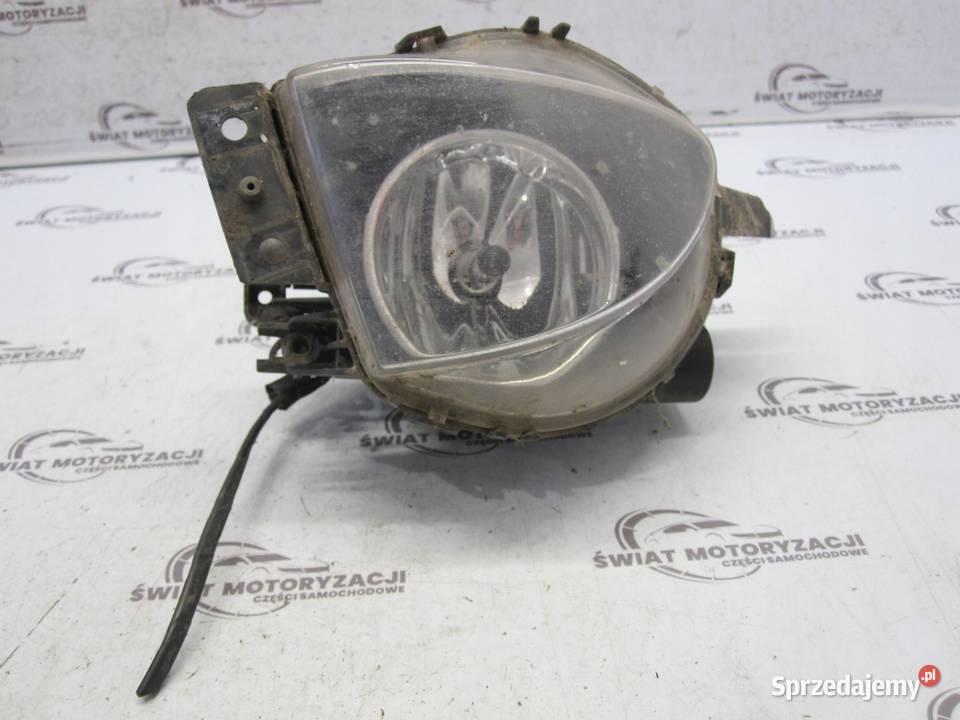 BMW E91 06r halogen prawy przód 6948374