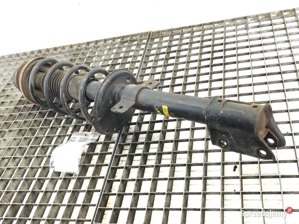 AMORTYZATOR LEWY PRZÓD ZE SPRĘŻYNĄ DACIA DUSTER