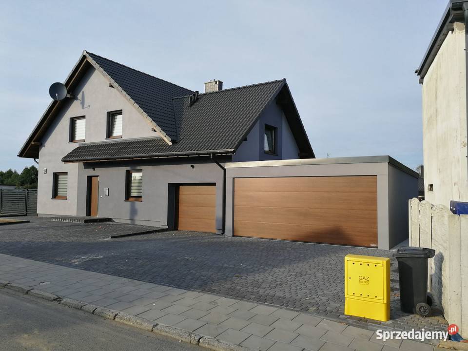 Garaż doklejony dostawiony do budynku tynkowany Wrocław