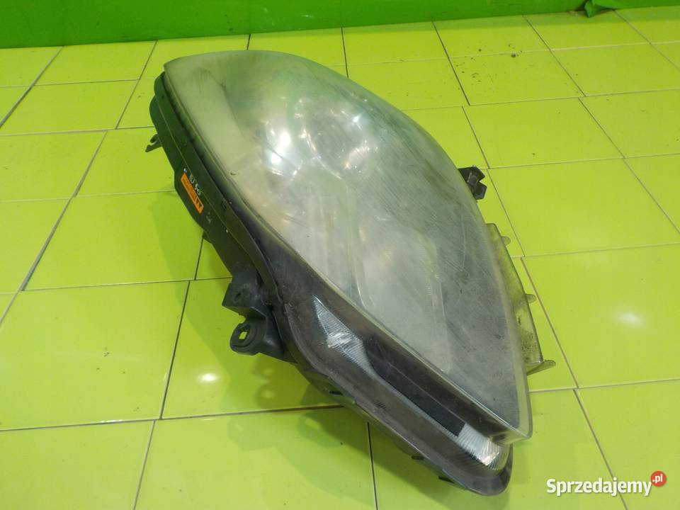 RENAULT KOLEOS I 20 DCI 09r 5D XENON lampa lewa Suków