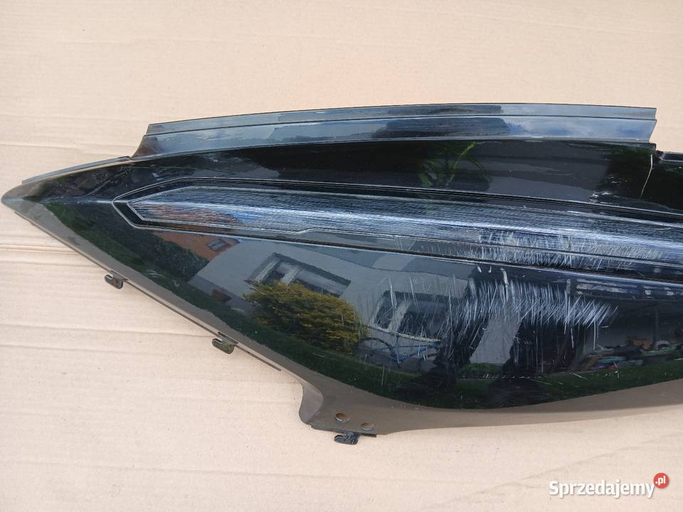 Zadupek lewy Emblematy Sym Gts 300i Skwierzyna