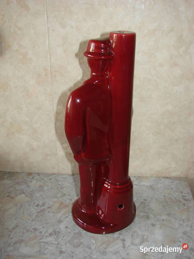 Mężczyzna pod latarnią podstawa lampy Pruszcz Gdański