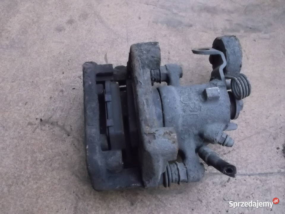 opel ZAFIRA 20DTL 02r zacisk hamulcowy lewy tył Zamość