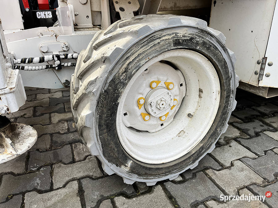 Zwyżka nożycowa terenowa Genie GS4069 RT 1412 m Kęty