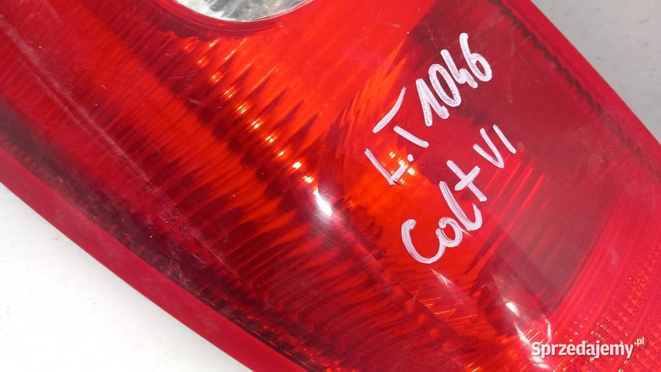 MITSUBISHI COLT VI MK6 HB LAMPA TYŁ LEWA osobowe Światła stop Zbierkowo