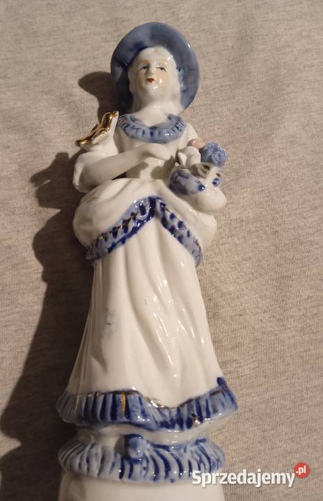 Porcelanowa figurka dziewczyna z bukietem i wielkopolskie Koźminek