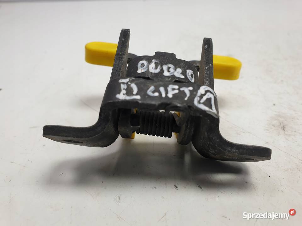 Fiat Doblo II lift PRAWY OGRANICZNIK DRZWI tył Rudka