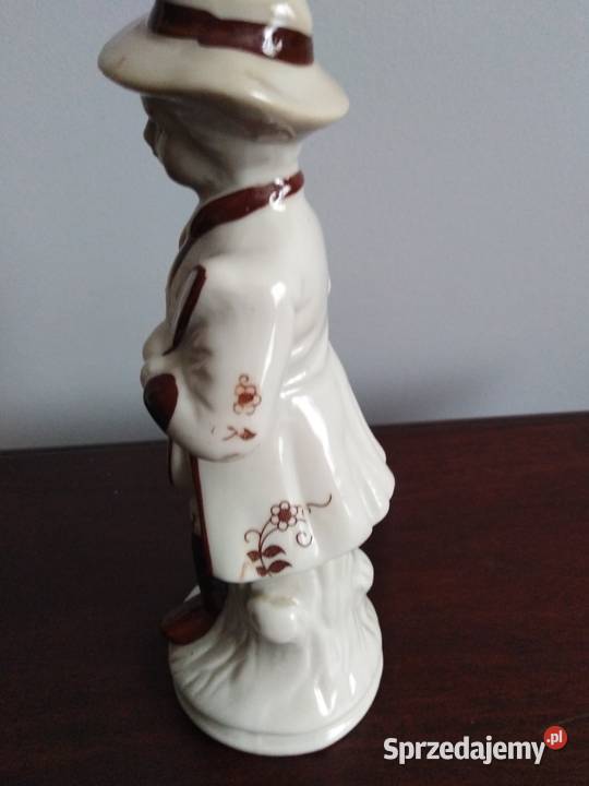 Porcelanowa figurka muzyk skrzypek antyk Miejsce Piastowe sprzedam