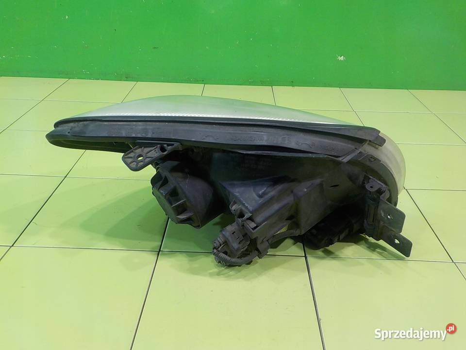 KIA SPORTAGE II 20 CRDI 05r 5D lampa lewa przod osobowe Lampy przednie Suków