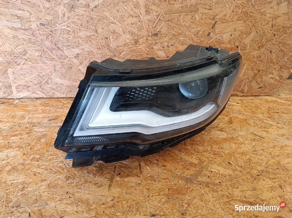 LAMPA LEWY PRZÓD REFLEKTOR XENON 0053434536 JEEP osobowe Nowy Tomyśl