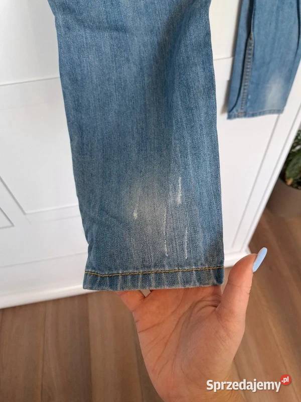 Jasnoniebieskie jeansy damskie z przetarciami i Rozmiar 36(S) Trąbki Wielkie