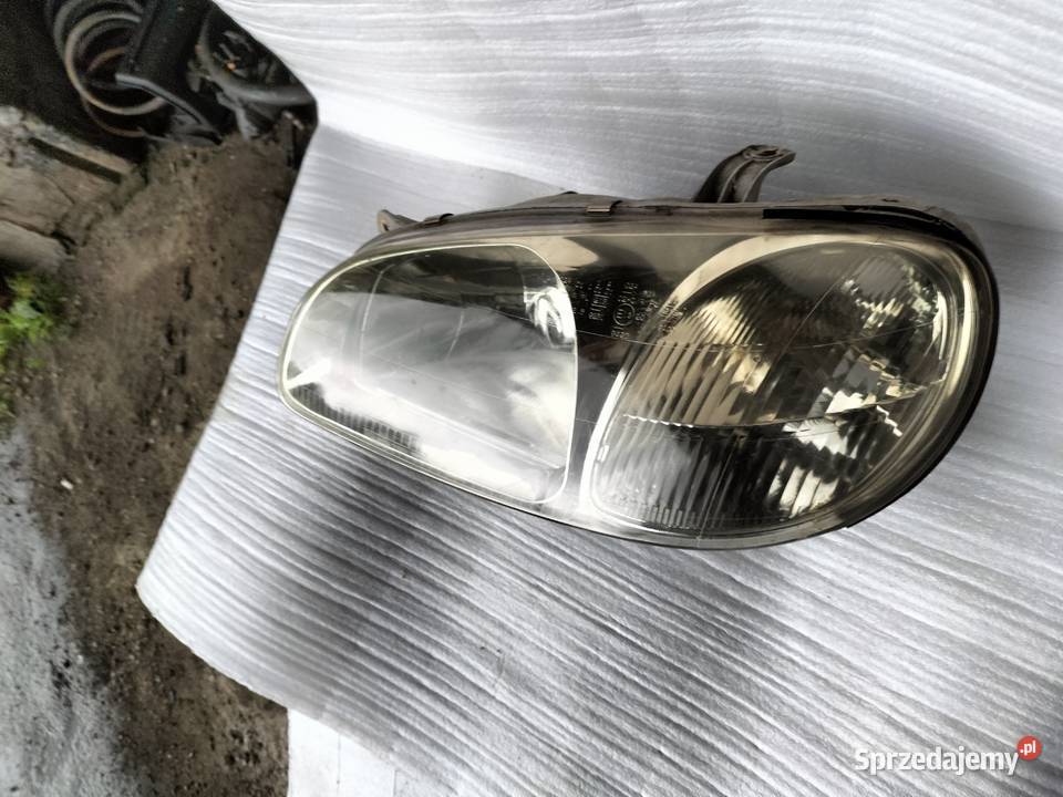 LAMPA PRZEDNIA PRZÓD LEWA KIA SEDONA CARNIVAL lampy przednie