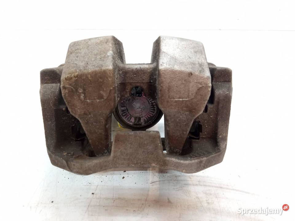 ZACISK HAMULCOWY LEWY TYŁ 20 HYBRID 883247903 sprzedam