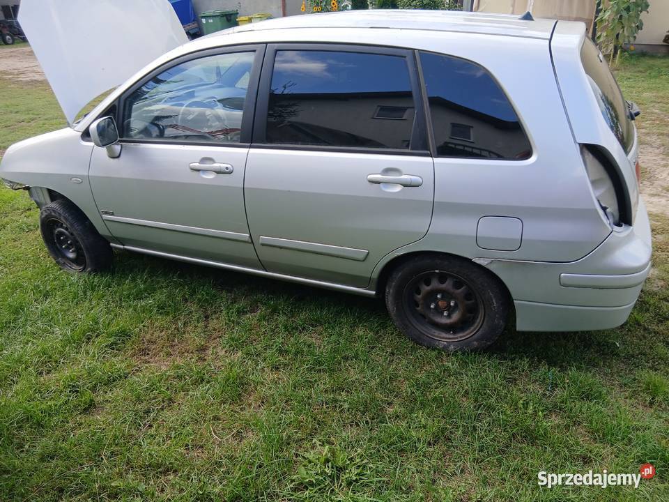 Suzuki liana czesci lampy drzwi maska Wieluń