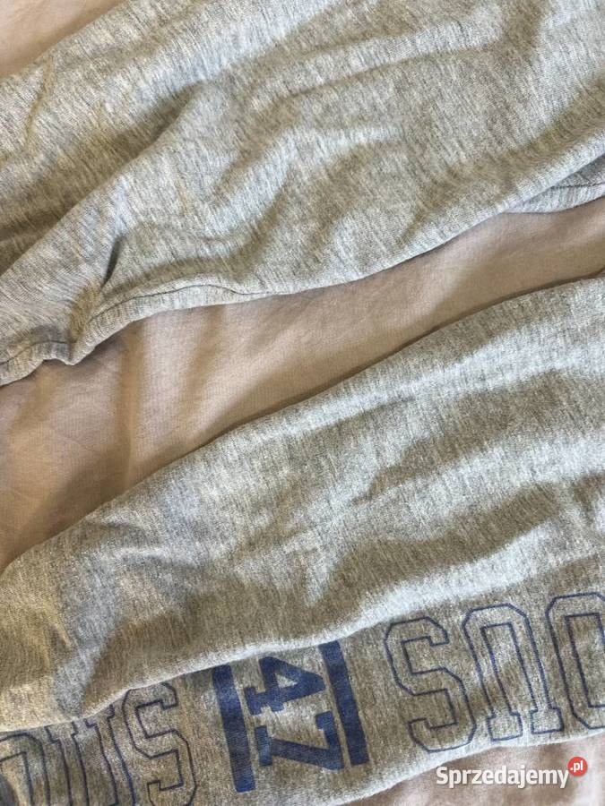 Szare legginsy getry z napisem na boku HIT Jasło
