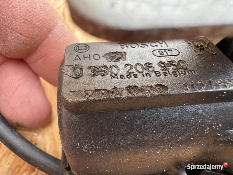 Silniczek wycieraczeki lampy przód prawy Volvo