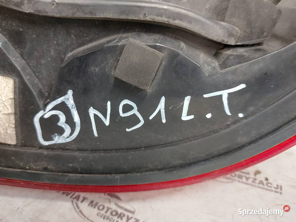 CAYENNE I 7L5 12r lampa lewa tył 7L5945095A osobowe