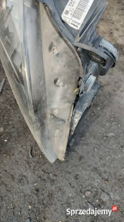 Reflektor lampa lewa prawa przód przednia Opel osobowe Książ Wielkopolski