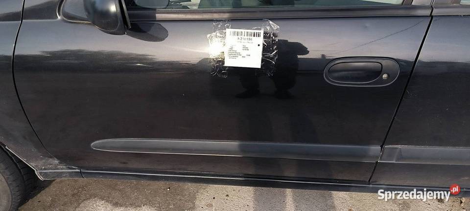 DRZWI LEWE PRZÓD NISSAN ALMERA osobowe