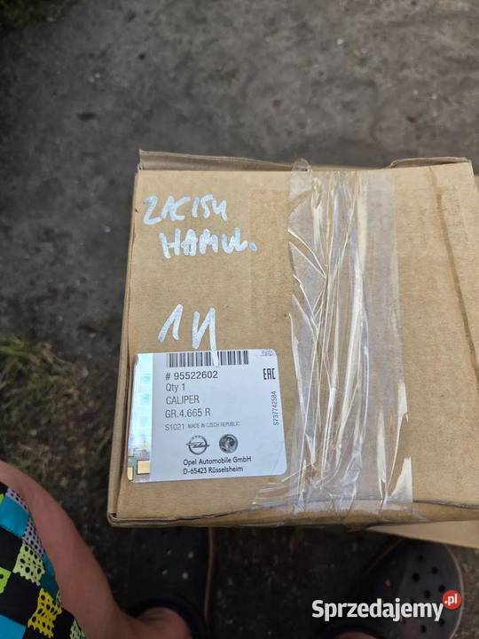 Zacisk hamulcowy lewy przód przedni Opel Astra J