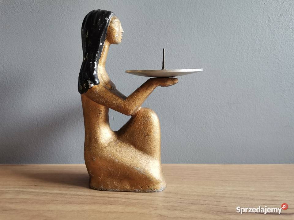 Stary metalowy świecznik figurka Egipcjaka