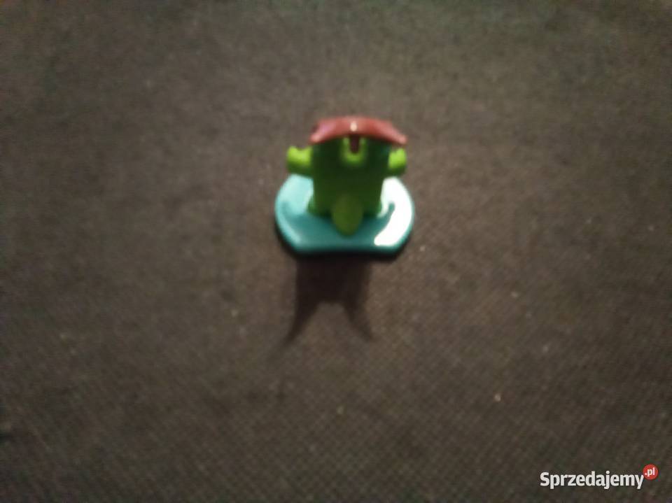 Figurka kinder bordowo zielona z serii Zabawki sprzedam