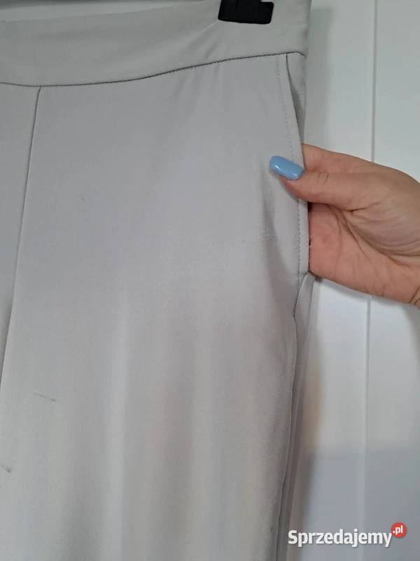 Beżowe eleganckie spodnie Maison dAmlie Paris EU Trąbki Wielkie