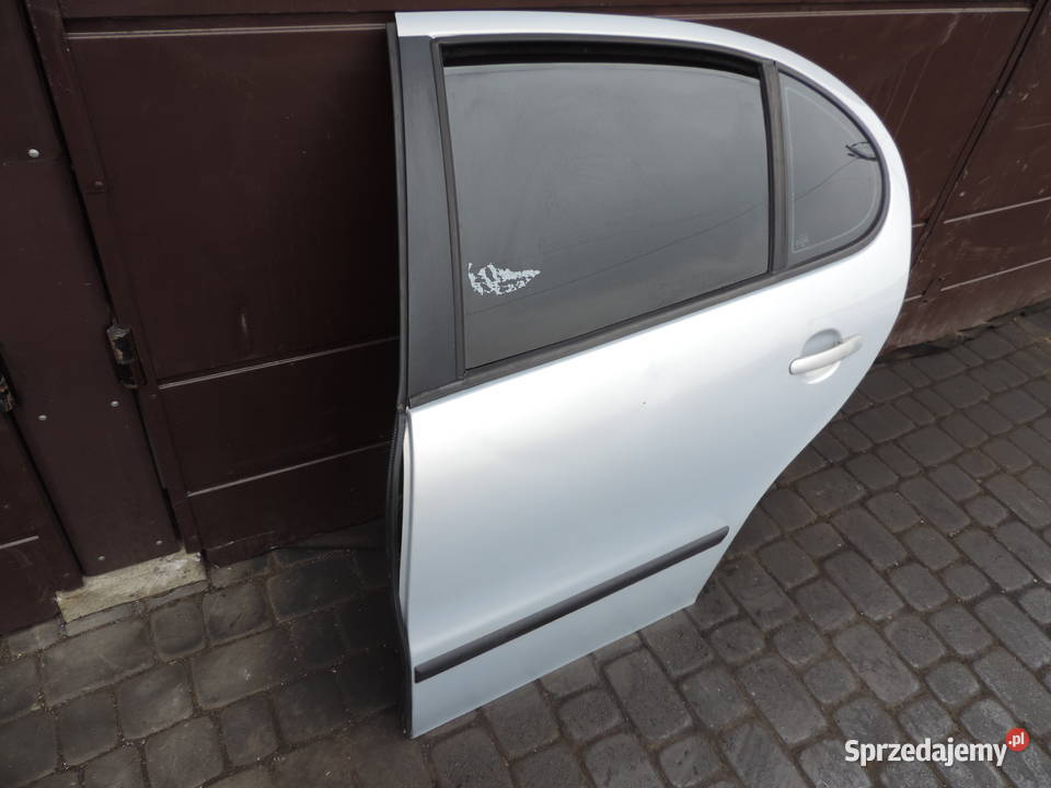 SEAT TOLEDO II LEON I DRZWI LEWY TYŁ LB7Z Nowy Sącz