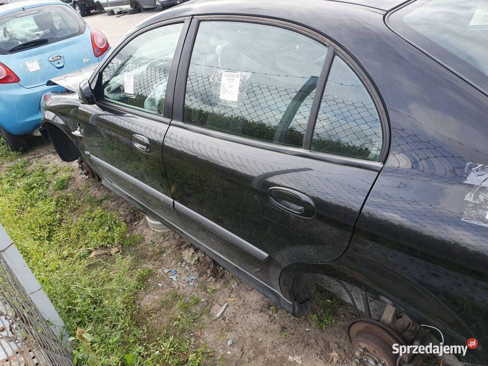 DRZWI LEWE TYŁ CHEVROLET EVANDA