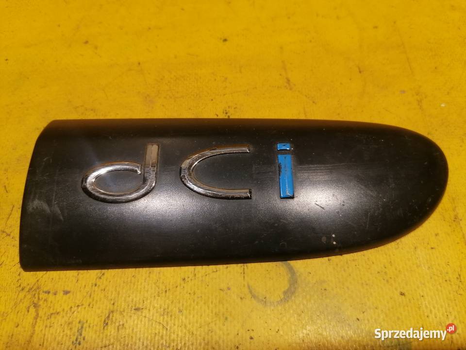 logo emblemat z drzwi przód prawy dci 8200072241