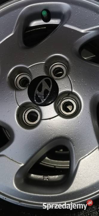 Felgi 4x100 14 opony 17570R14 Hankook zimowe