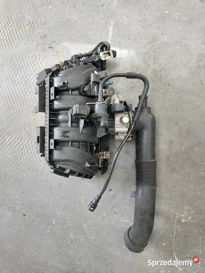 Kolektor dolotowy ssący Opel Corsa D 12 Z12XEP