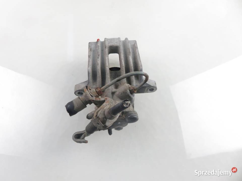 ZACISK LEWY TYŁ VW GOLF V 16 FSI osobowe