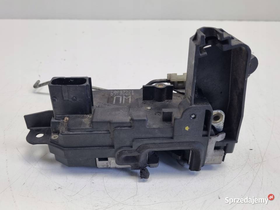 ZAMEK DRZWI Opel Astra H Zafira B LEWY PRZÓD