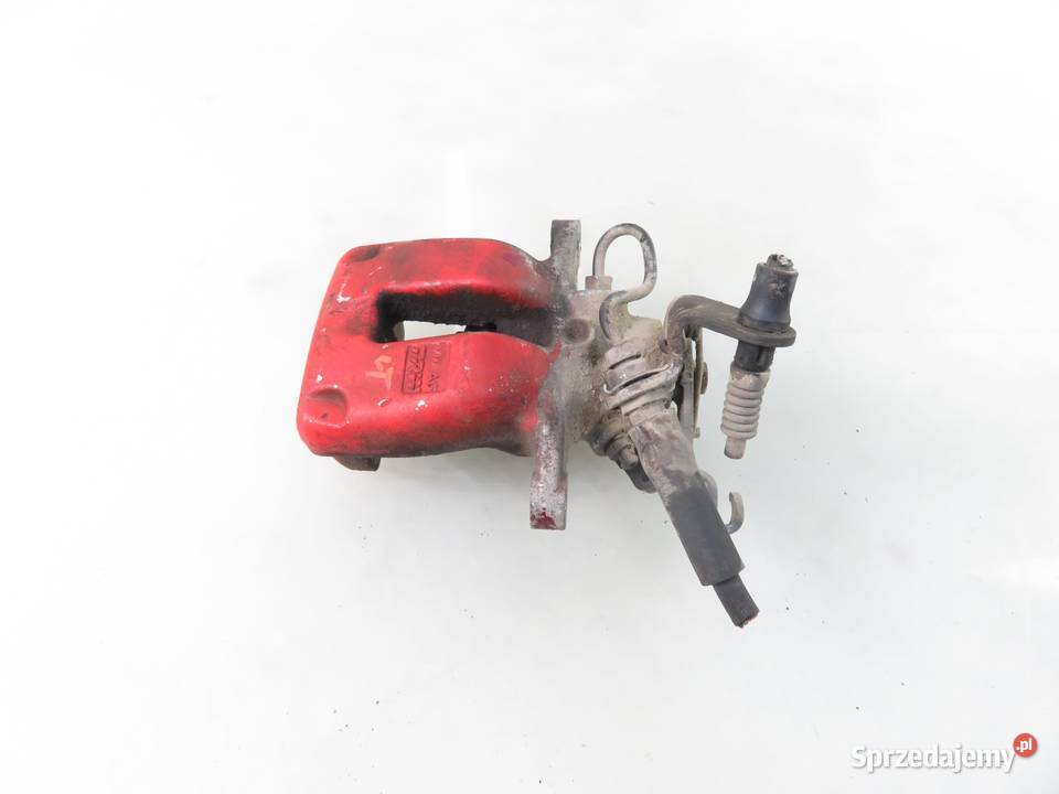 ZACISK LEWY TYŁ AUDI A3 Sportback 8PA 20 TDI Motoryzacja