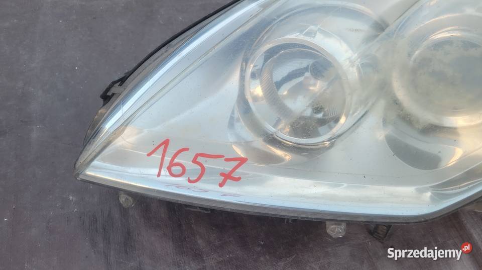 RENAULT LAGUNA III 0710 REFLEKTOR LEWY LAMPA Ruda Śląska
