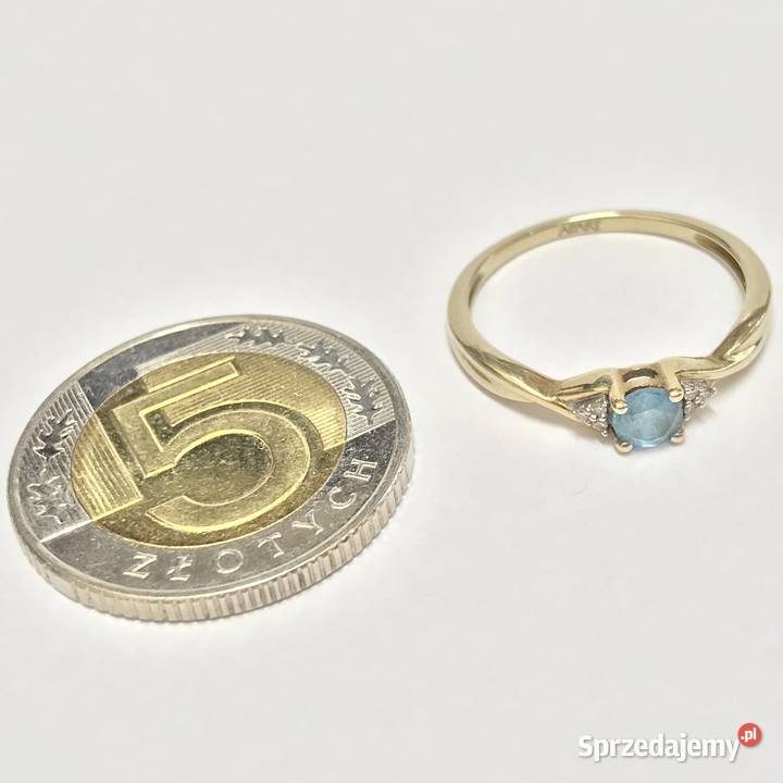 Złoty pierścionek 9K 375 z błękitnym topazem i Warszawa sprzedam