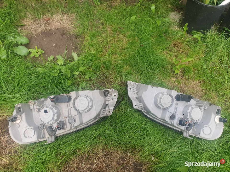 Lampa przednia Reflektor prawy lewy Kia Carnival