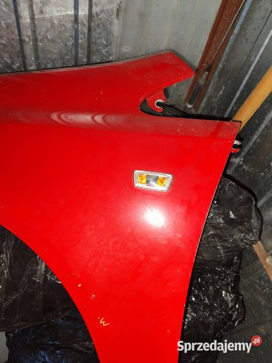 Błotnik przedni lewy Corsa D czerwony Zawiercie sprzedam