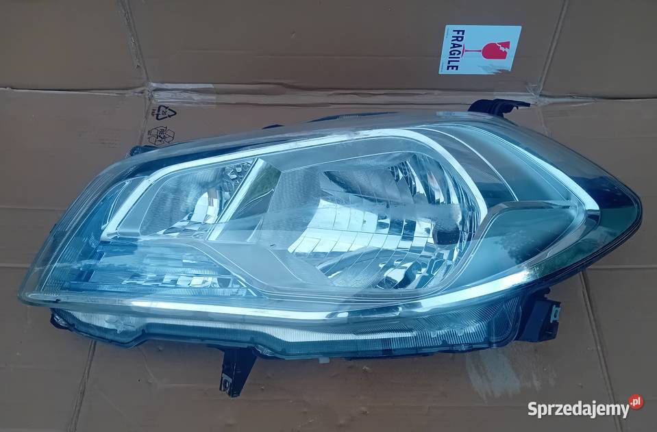 Suzuki SX4 Cross reflektor lampe lewy przód Oświetlenie Przeźmierowo