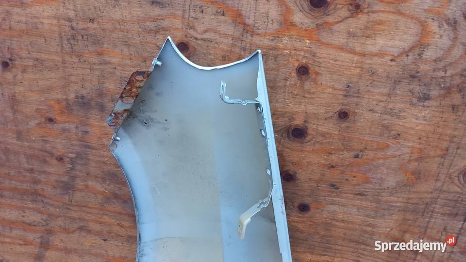 FIAT GRANDE PUNTO EVO BŁOTNIK PRZÓD PRAWY 457B Zbierkowo