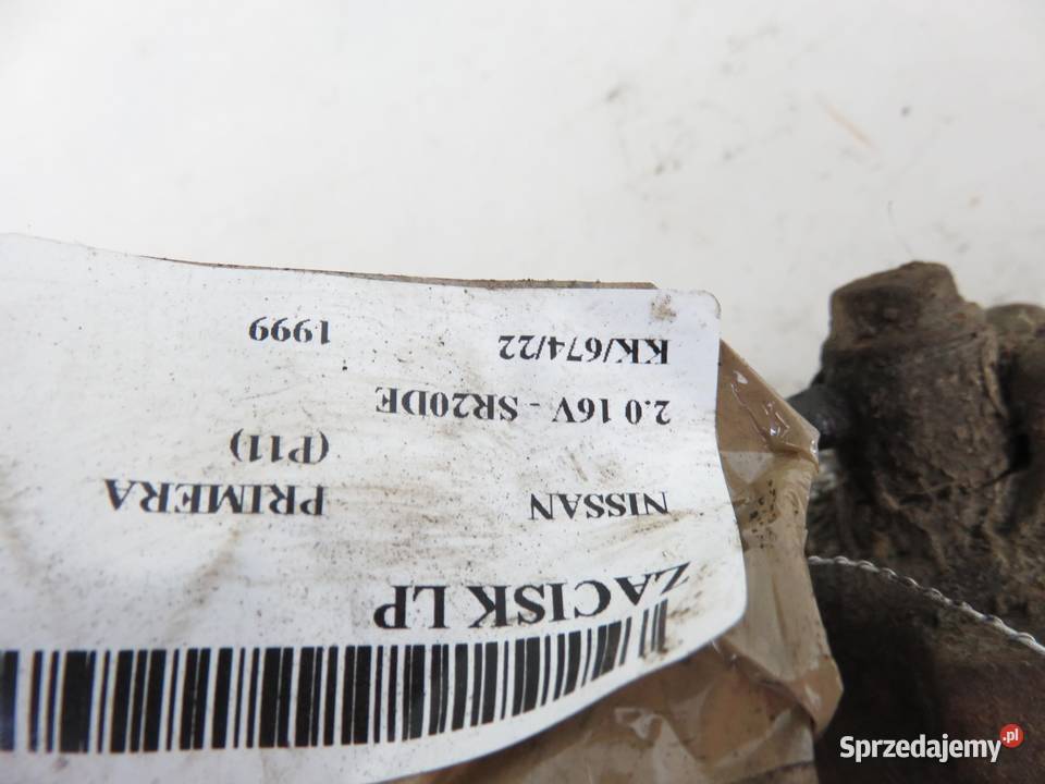 ZACISK LEWY PRZÓD NISSAN PRIMERA P11 20 16V