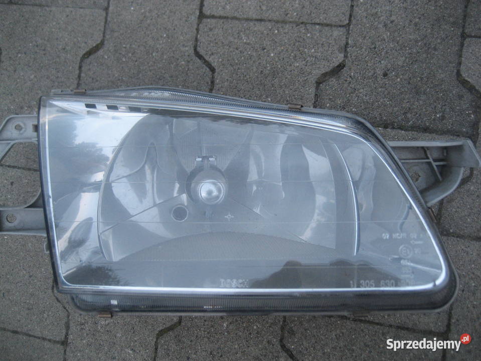 mazda 323 f 9800r lampa przód prawa bosch Oświetlenie