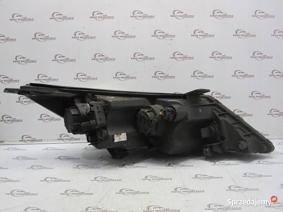 KIA SPORTAGE III 12r lampa lewa przód 921013WXXX
