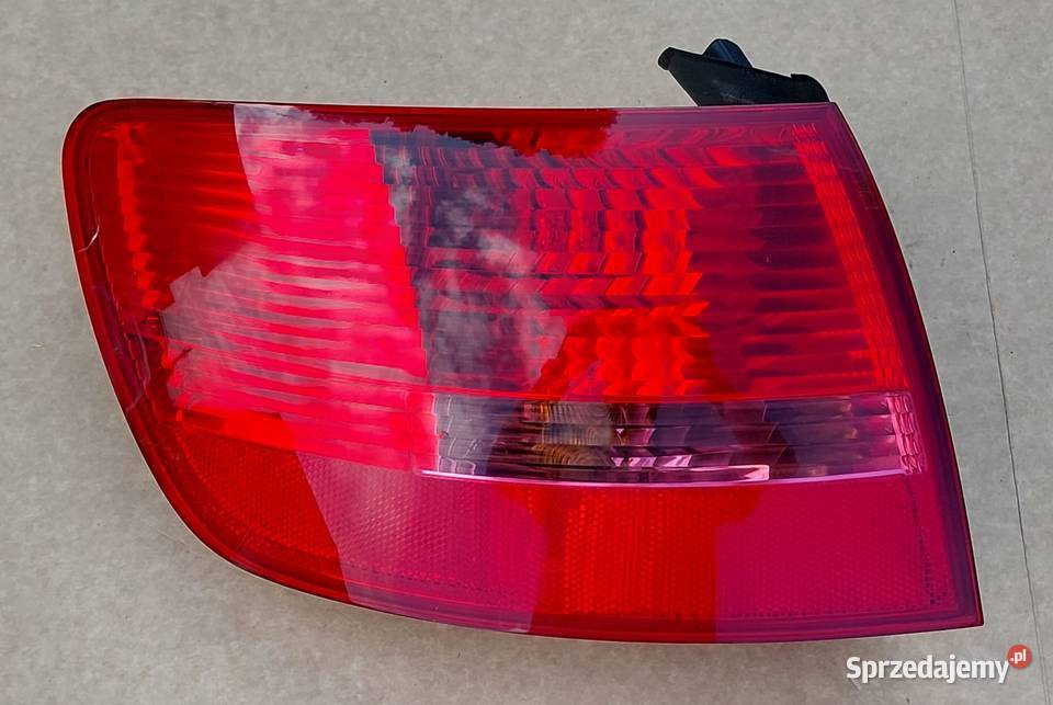 LAMPA LEWA TYŁ TYLNA AUDI A6 C6 KOMBI 89034302 Lampy tylne Mielęcin