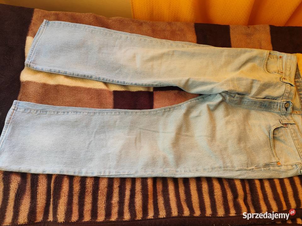 Spodnie Levis 501 jasno niebieskie W38 L30 stan Szadek