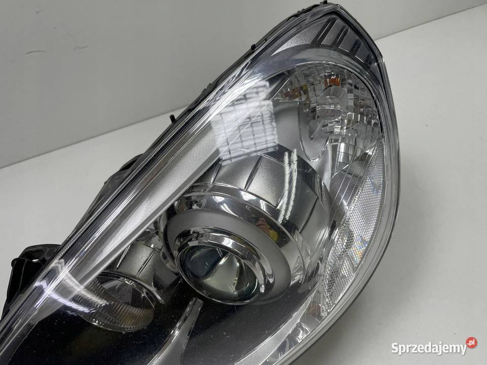 LAMPA REFLEKTOR VOLVO S60 V60 LEWY XENON EUROPA