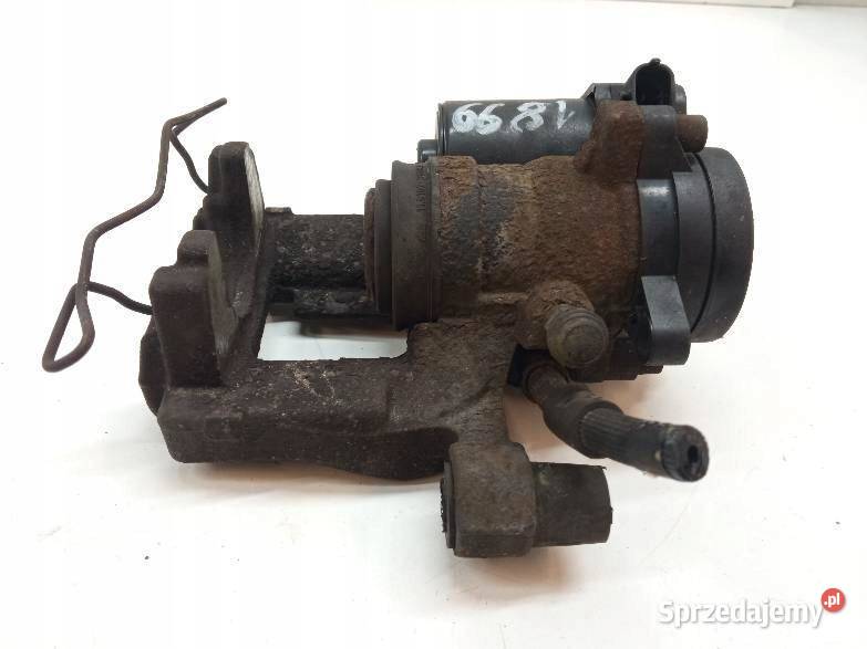 ZACISK HAMULCOWY LEWY TYŁ 20 TDCI DG9G2D251H osobowe