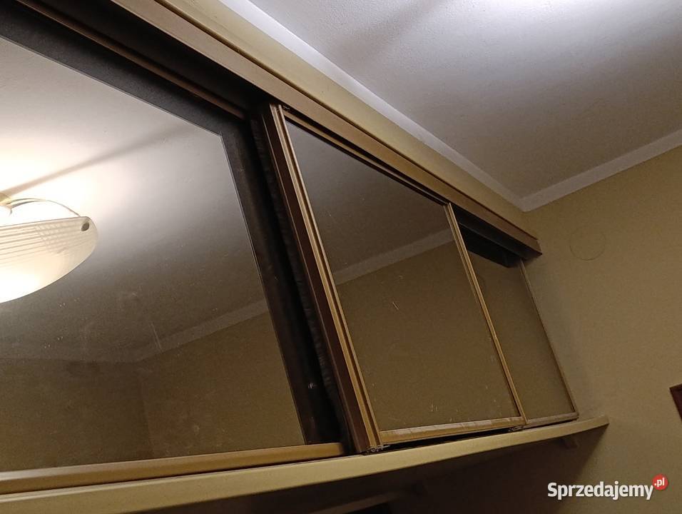 pawlacz z drzwiami przesuwnymi szklanymi Poznań