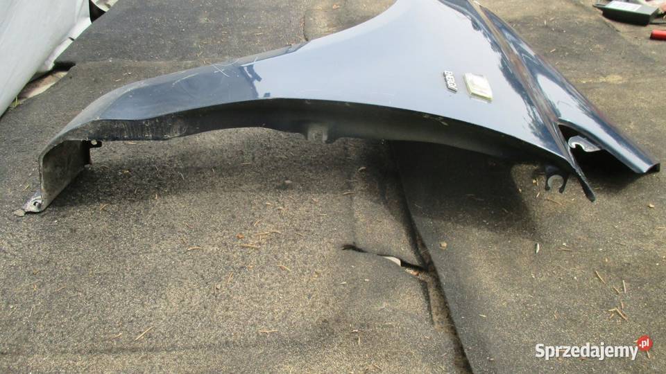 OPEL CORSA D 13r HB 5D błotnik lewy przód
